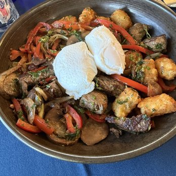 Farm House - A breakfast/brunch skillet with steak, mushrooms, tater tots, and eggs. - New American Near Me - Belmont, California