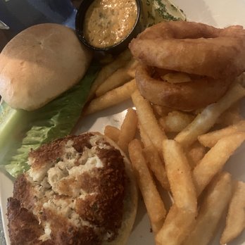 Miller's Waterfront Restaurant - Crab cake sandwich (I flattened it to fit the bun). - Seafood Near Me - Nags Head, North Carolina Miller's Waterfront Restaurant - Crab cake sandwich (I flattened it to fit the bun). - Seafood Near Me - Nags Head, North Carolina