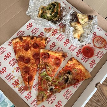 Masani Pizza - Top: Broccoli pinwheel, garlic knots with dipping sauce Bottom: Hot Head and Supreme Clientele - Pizza Near Me - Forest Hills, New York