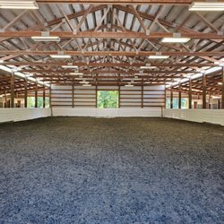 The Riding School - We enjoy riding year-round in our beautiful indoor riding arena.