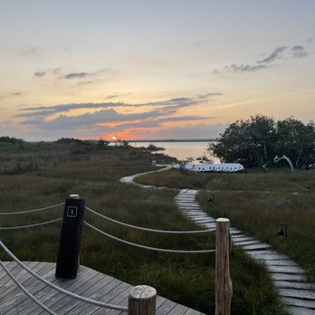Eugene Toriko - An amazing sunrise over the lagoon - Travel Agents Near Me - Atlanta, Georgia