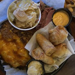 The Dubliner: Irish egg rolls, corned beef and cabbage, shepherd's pie with a mustard dip & thousand island sauce The Dubliner: Irish egg rolls, corned beef and cabbage, shepherd's pie with a mustard dip & thousand island sauce