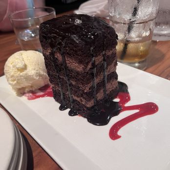 Burtons Grill & Bar - Seven layer chocolate cake - New American Near Me - South Windsor, Connecticut Burtons Grill & Bar - Seven layer chocolate cake - New American Near Me - South Windsor, Connecticut