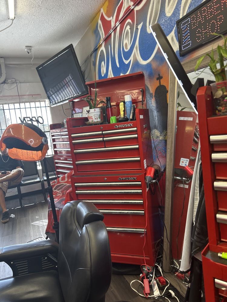 The 303 Family Barbershop and Salon Logo