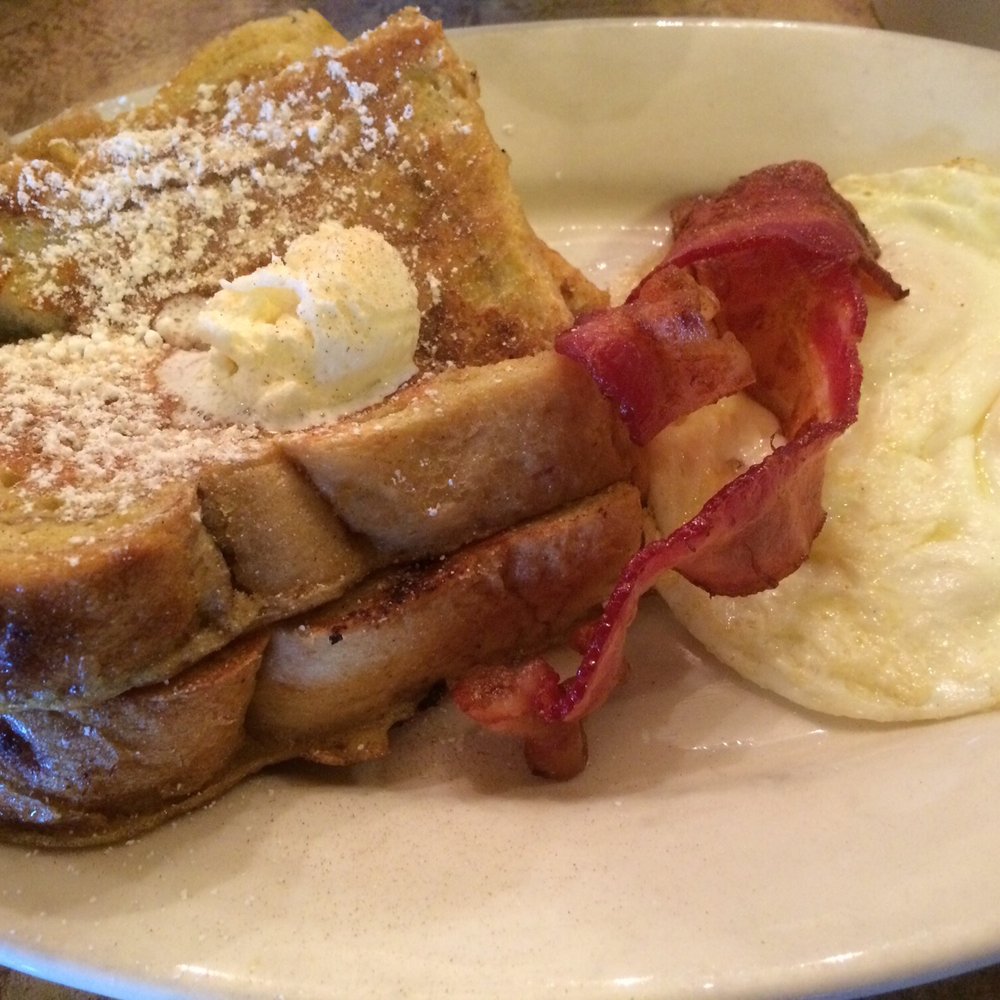 Crackers & Co Cafe - The Day Break. Two eggs, two pieces of bacon, and I upgraded my French toast to Butterfinger Banana French Toast. - American Near Me - Tempe, Arizona Crackers & Co Cafe - The Day Break. Two eggs, two pieces of bacon, and I upgraded my French toast to Butterfinger Banana French Toast. - American Near Me - Tempe, Arizona