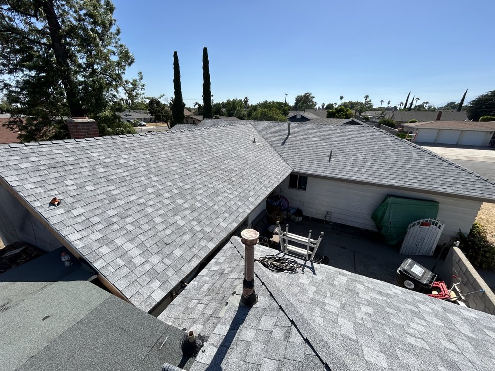 Slide of EZ Roof Repairs