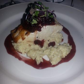 Chart House - Chilean seabass with a port wine berry reduction, gruyere risotto topped with arugula. - Seafood Near Me - Weehawken, New Jersey