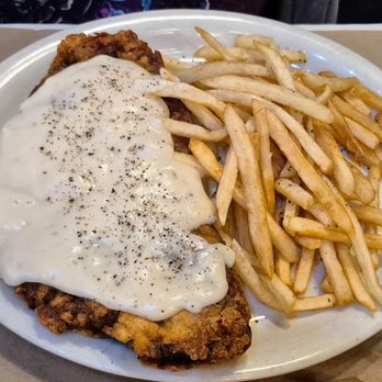 Triple J Chophouse & Brew - Chicken fried steak with gravy and French fries - Steakhouses Near Me - Lubbock, Texas Triple J Chophouse & Brew - Chicken fried steak with gravy and French fries - Steakhouses Near Me - Lubbock, Texas