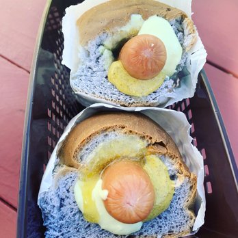 Hula Dog - Polish dog on a taro bacon bun with lilikoi mustard abc mango relish - Hot Dogs Near Me - Honolulu, Hawaii Hula Dog - Polish dog on a taro bacon bun with lilikoi mustard abc mango relish - Hot Dogs Near Me - Honolulu, Hawaii