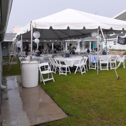 Tent, tables and chairs from Vero Beach Party Rentals