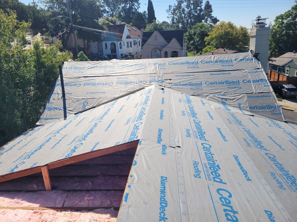 Slide of Astro Roofing