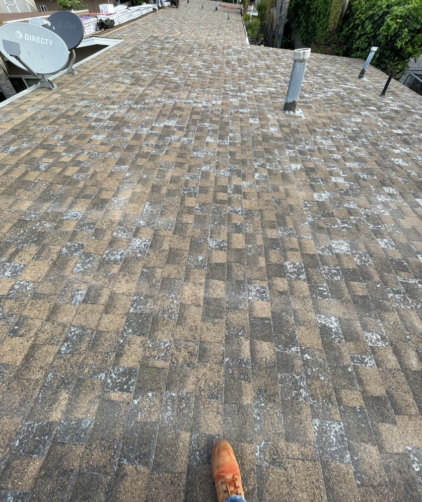 Slide of Balam Roofing