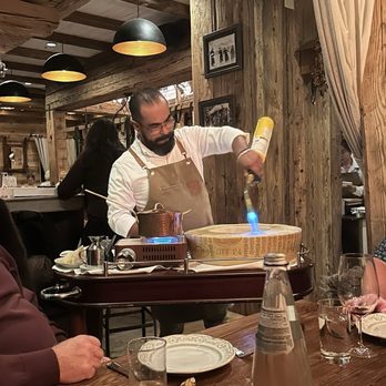 Aosta Ristorante - Chef preparing our Cacio E Pepe table side. - Italian Near Me - Aspen, Colorado Aosta Ristorante - Chef preparing our Cacio E Pepe table side. - Italian Near Me - Aspen, Colorado