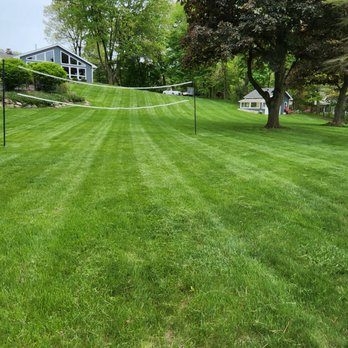 Red Line Lawn Service - a tennis net in the middle of a lawn - Lawn Services Near Me Red Line Lawn Service - a tennis net in the middle of a lawn - Lawn Services Near Me