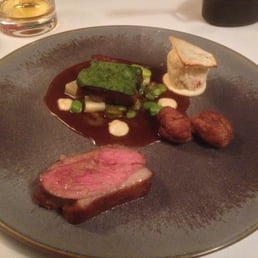 Achill mountain lamb with broad beans and salt baked celeriac, Madeira sauce with caper flowers