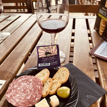 Rendez-vous Winery - a plate of meat and cheese with a glass of wine - Wineries Near Me - Clarksburg, California