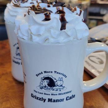 Grizzly Manor Cafe - Delicious Hot Chocolate ($3.50 each). Mugs are also for sale ($12 each). - Breakfast & Brunch Near Me - Big Bear Lake, California
