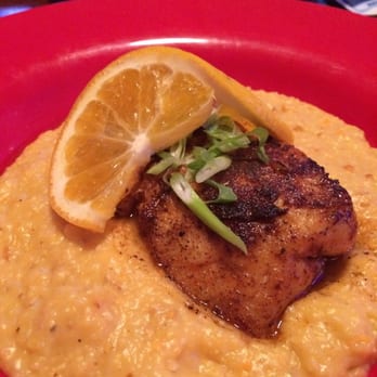 Wahoo Seafood Grill - Blackened grouper on a bed of cheese grits - Seafood Near Me - Gainesville, Florida