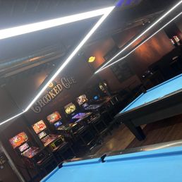Pool tables, Vintage pinball games. Pool tables, Vintage pinball games.