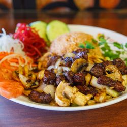 Pho Saigon Pearl - Shake it, sear it, devour it Perfectly tender filet mignon cubes tossed and perfectly prepared in our Wok. NOT your average steak dish.