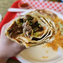 Hacienda Grill - Inside Carne Asada burrito. Combo version with rice and beans on the side.