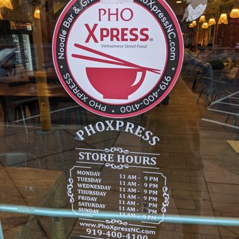 Pho Xpress - Outside. One of the entrances. Business hours posted on the storefront. - Vietnamese Near Me - Raleigh, North Carolina Pho Xpress - Outside. One of the entrances. Business hours posted on the storefront. - Vietnamese Near Me - Raleigh, North Carolina