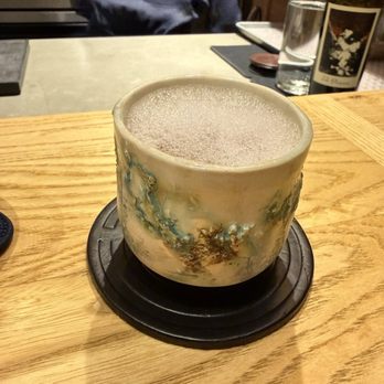 MĀZE - Shell glass with essence of tomato cocktail - New American Near Me - Honolulu, Hawaii