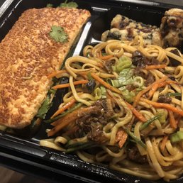 Sesame bun with "pasta" and fried seaweed rolls Sesame bun with "pasta" and fried seaweed rolls
