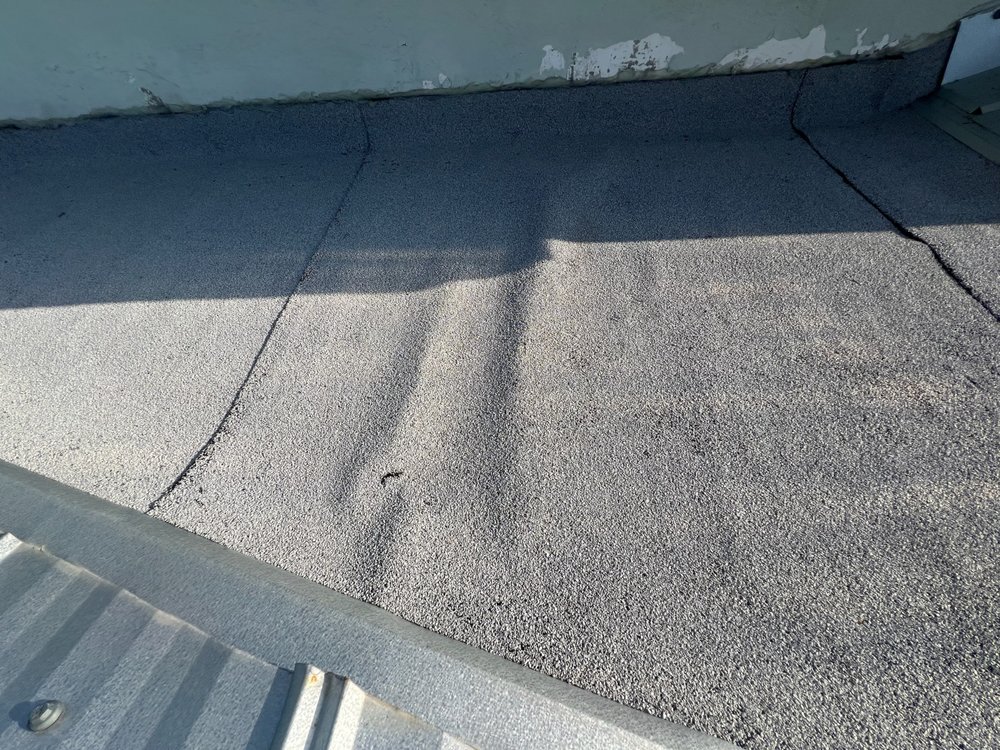 Slide of Modtek Roofing