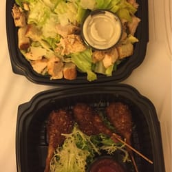 Harry's Pub - Chicken Caesar salad and coconut shrimp skewers