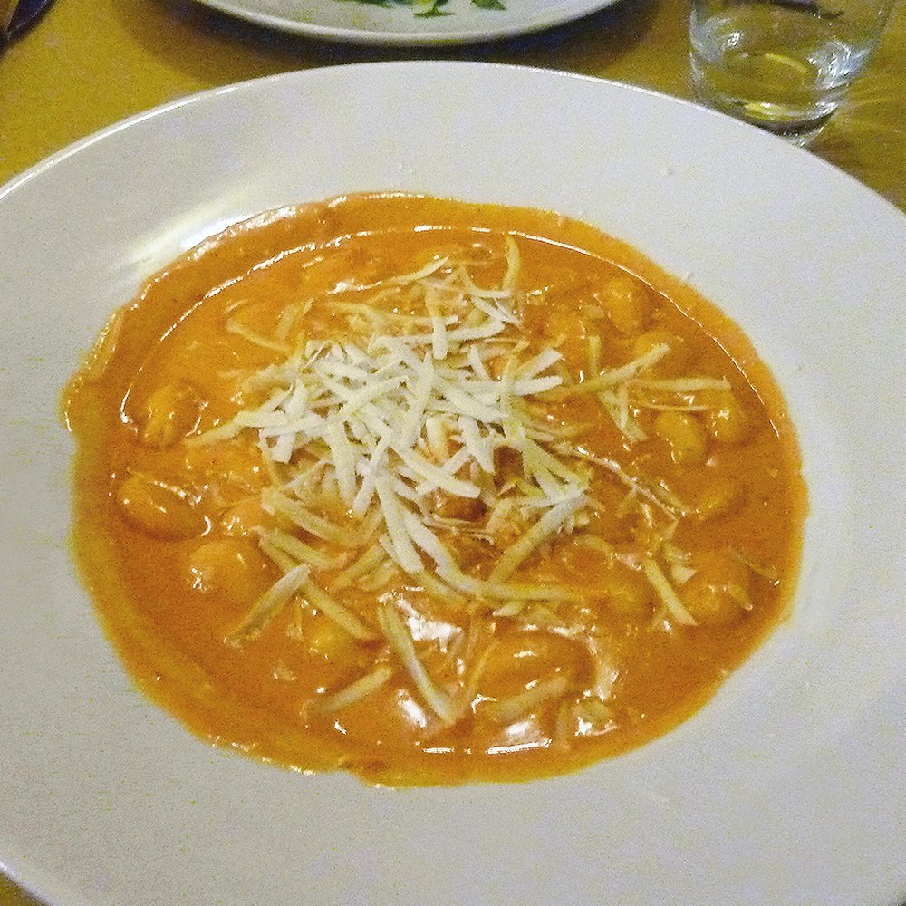 Osteria Cipolla Rossa - Gnocchi with hot sauce, pecorino cheese, salami with roasted red peppers - Italian Near Me - Florence, FI Osteria Cipolla Rossa - Gnocchi with hot sauce, pecorino cheese, salami with roasted red peppers - Italian Near Me - Florence, FI