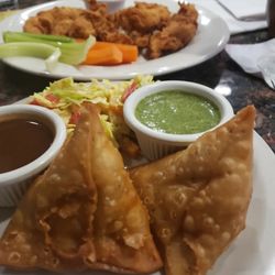 East Derry Tavern - Delicious appetizers.... Somosa's, buffalo wontons, and crunchy chicken tenders. So yummy!