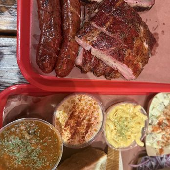 Terry Black's Barbecue - Sides: beans, corn, Mac n cheese, potato salad Meat: sausage, pork ribs, brisket, chopped brisket All the meats were very moist!! - Barbeque Near Me - Austin, Texas Terry Black's Barbecue - Sides: beans, corn, Mac n cheese, potato salad Meat: sausage, pork ribs, brisket, chopped brisket All the meats were very moist!! - Barbeque Near Me - Austin, Texas