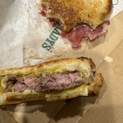 Beef 'O' Brady's - Raw burger. Ordered medium. Looks like a frozen patty that was set on the grill for a couple minutes. Gross.