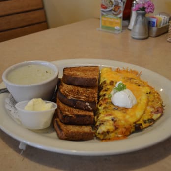 Awake - The Egg-Ceptional Omelette with wheat toast and grits. - Breakfast & Brunch Near Me - Carrollton, Texas Awake - The Egg-Ceptional Omelette with wheat toast and grits. - Breakfast & Brunch Near Me - Carrollton, Texas