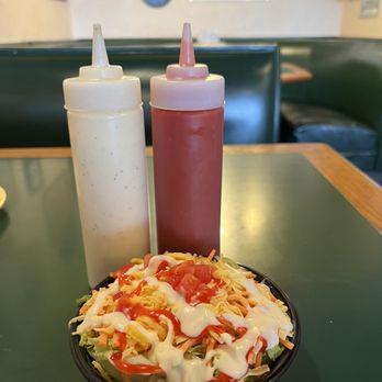 Monical's Pizza - a plate of salad and condiments - Pizza Near Me - Lafayette, Indiana