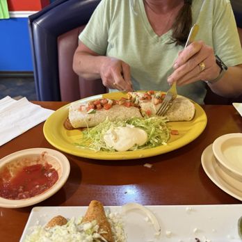 La Oaxaqueña - My wife's burrito. Cheese on the side. She was a fan. - Tacos Near Me - St. Louis, Missouri La Oaxaqueña - My wife's burrito. Cheese on the side. She was a fan. - Tacos Near Me - St. Louis, Missouri