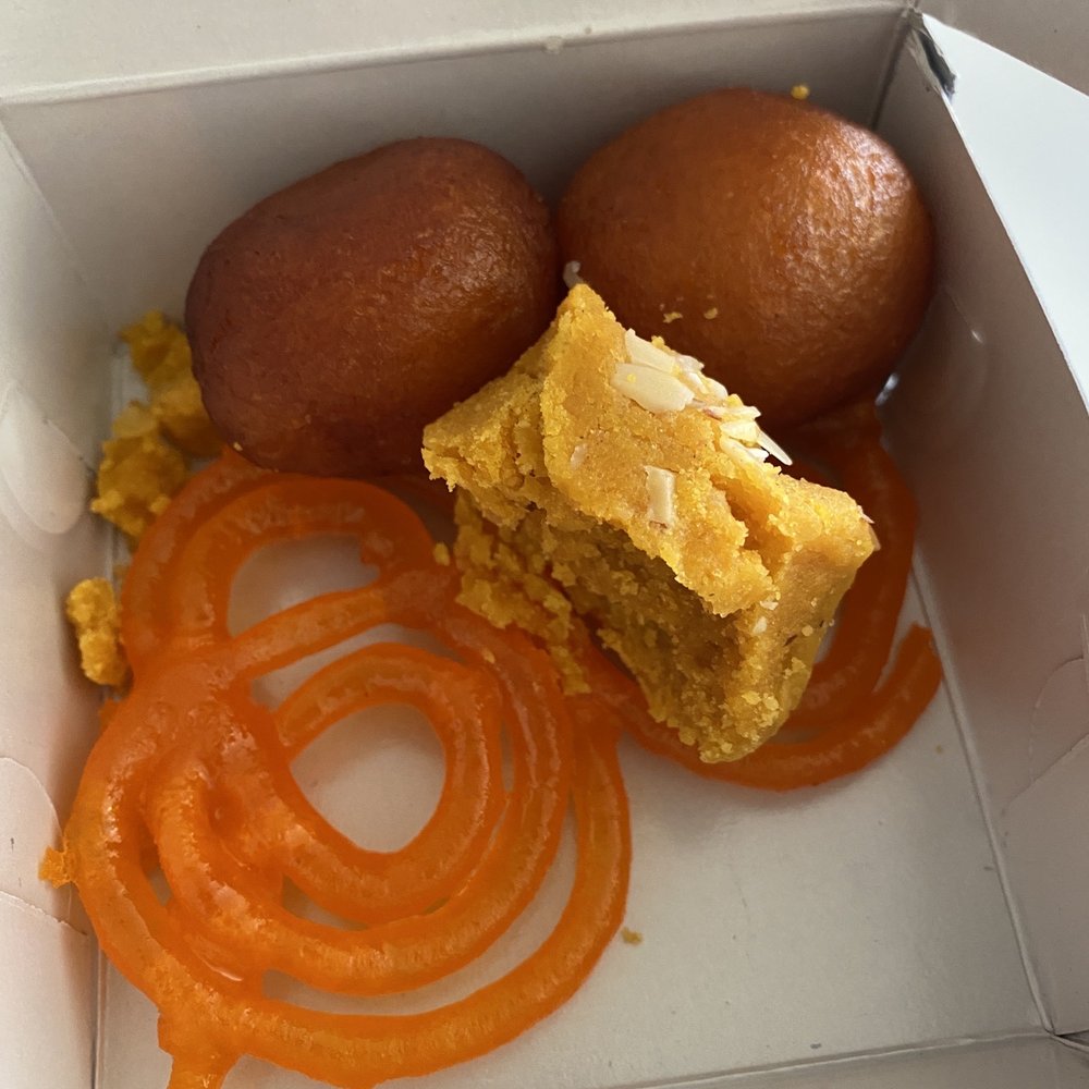 Ladoo by weight. Very sweet but so good. Ladoo by weight. Very sweet but so good.