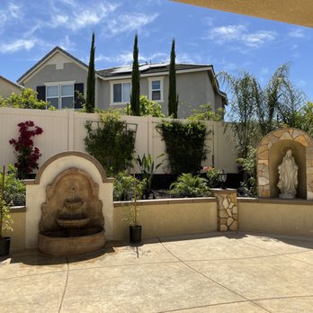 CR Pacific Landscape Design and Construction - Back yard: custom wall, pillars with lights, custom built grotto, drip line was installed for newly installed plants and trees. - Landscaping Near Me - Murrieta, California