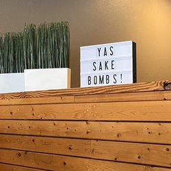 Umami Sushi - Sake sign