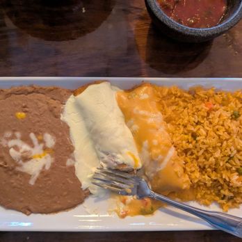 Hermano’s Mexican Restaurant - Sour cream chicken enchilada and cheese enchilada topped with queso - Mexican Near Me - Allen, Texas Hermano’s Mexican Restaurant - Sour cream chicken enchilada and cheese enchilada topped with queso - Mexican Near Me - Allen, Texas