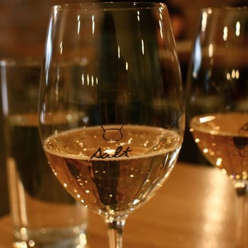 Salt Chinatown - two glasses of wine on a table - Wine Bars Near Me - Vancouver, British Columbia