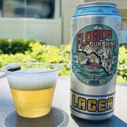 Crooked Can Brewing Company - 5% ABV Florida Sunshine Lager, the refined gentleman's pool beer.