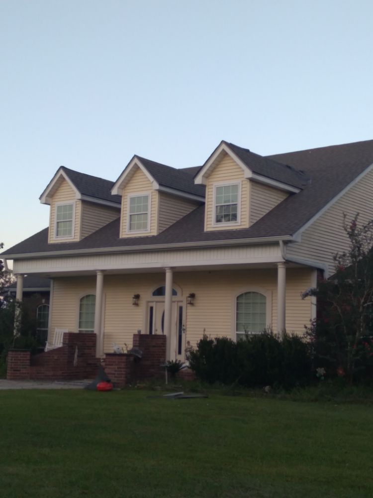 Slide of J&K Roofing Company