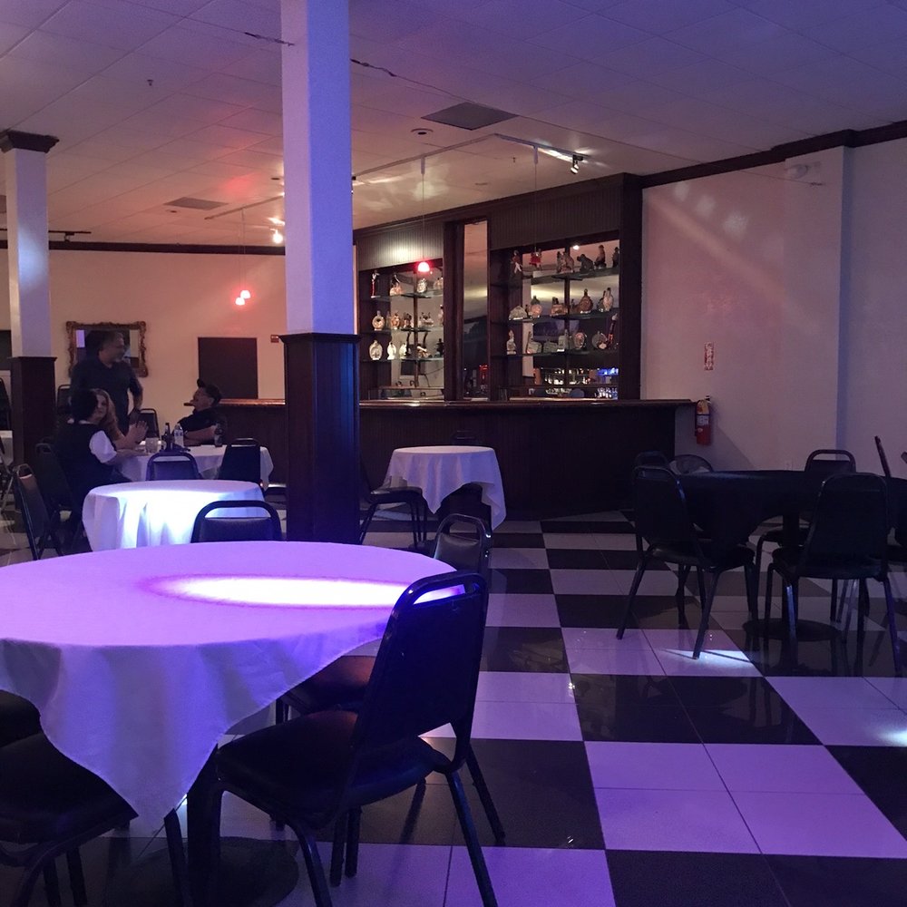 Frank's Place - a restaurant with a checkered floor - Music Venues Near Me - Fresno, California