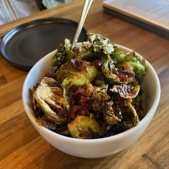 Centro Bar & Kitchen - Fried brussel sprouts with bacon and pomegranate vinaigrette - Tapas/Small Plates Near Me - Reno, Nevada Centro Bar & Kitchen - Fried brussel sprouts with bacon and pomegranate vinaigrette - Tapas/Small Plates Near Me - Reno, Nevada