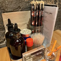 RAMEN-SAN - Chili oil, low sodium soy sauce, chili flakes and furikake on each table