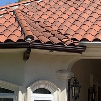 Crocodile Window Cleaning & Pressure Washing - Broken tile. - Window Washing Near Me Crocodile Window Cleaning & Pressure Washing - Broken tile. - Window Washing Near Me