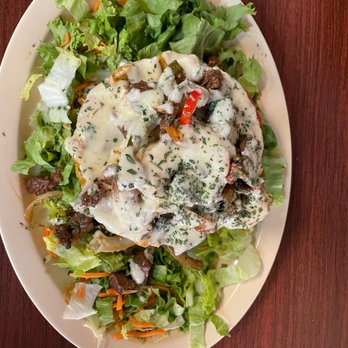 El Mofongo - a plate of food on a table - Puerto Rican Near Me - Arlington, Texas El Mofongo - a plate of food on a table - Puerto Rican Near Me - Arlington, Texas