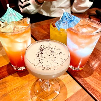 Von's 1000Spirits - (front) Tempus Fugit Espresso Martini (left & right) Magic Mai Tai (back) Champagne Mango Margarita - New American Near Me - Seattle, Washington Von's 1000Spirits - (front) Tempus Fugit Espresso Martini (left & right) Magic Mai Tai (back) Champagne Mango Margarita - New American Near Me - Seattle, Washington